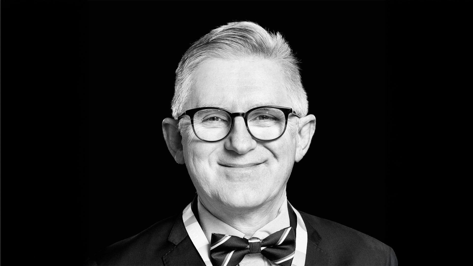 Black and white headshot of Patrick O'Shea