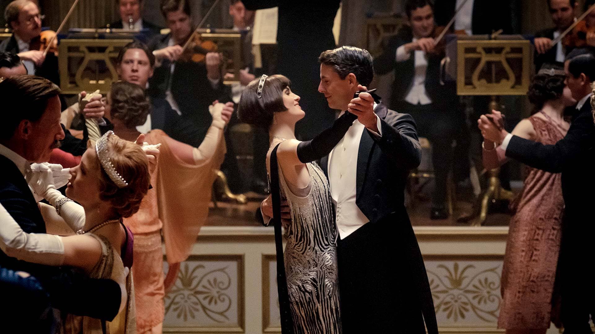 Still from "Downton Abbey" movie, showing Michelle Dockery as Lady Mary Talbot dancing with Matthew Goode as Henry Talbot