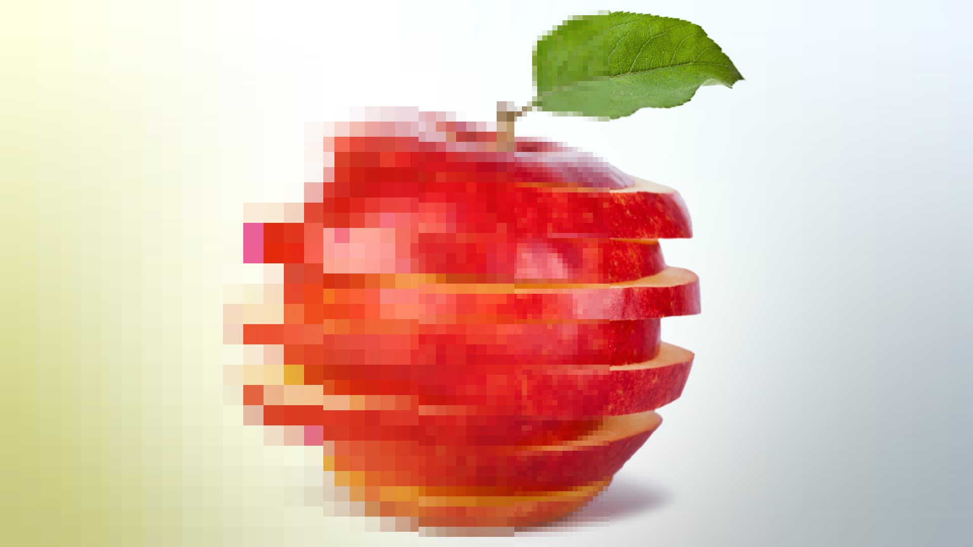 a sliced red apple that is half pixelated and half clear