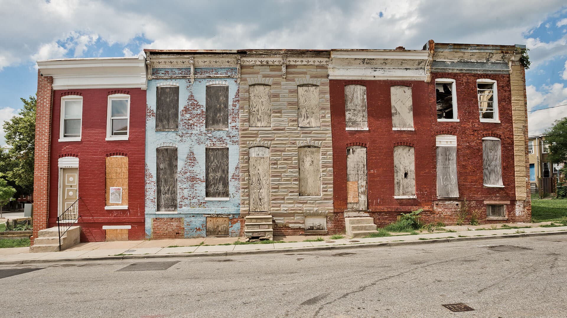 Boarded-up rowhouses