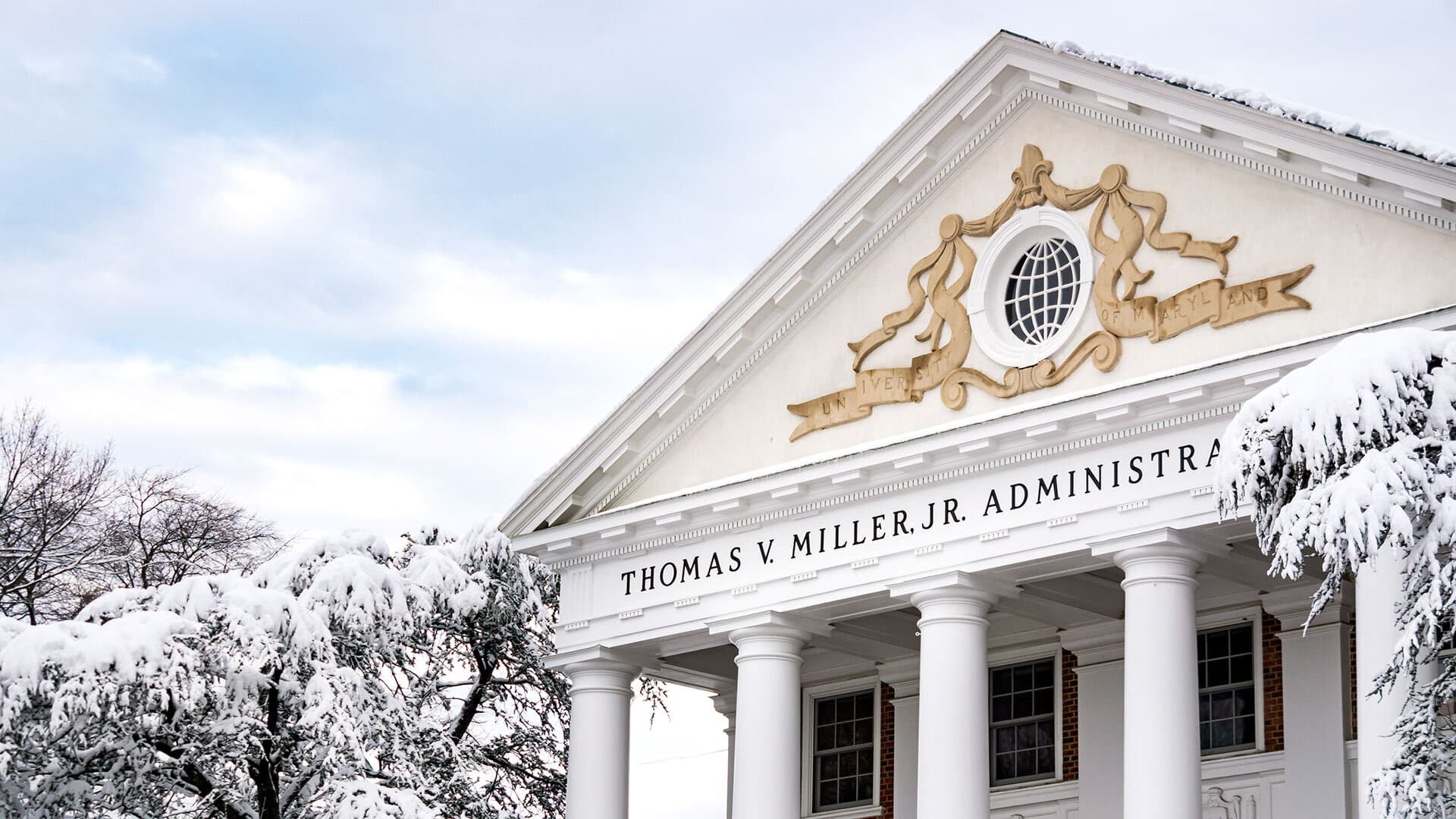 Snow-covered Thomas V. Miller, Jr. Administration building