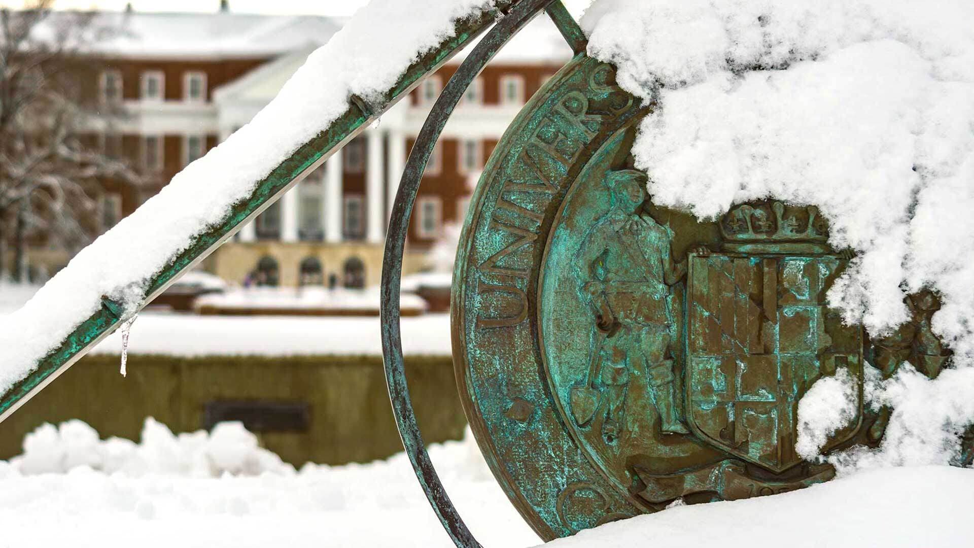 Campus sundial covered in snow