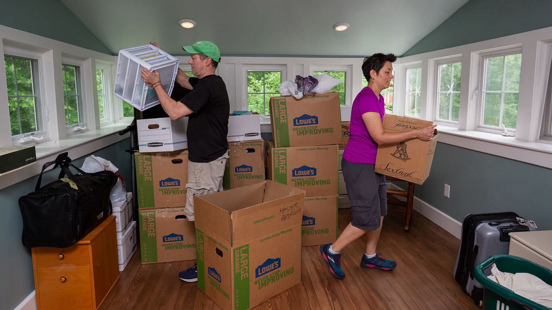 Gene Ferrick and Joann Prosser move into their new home