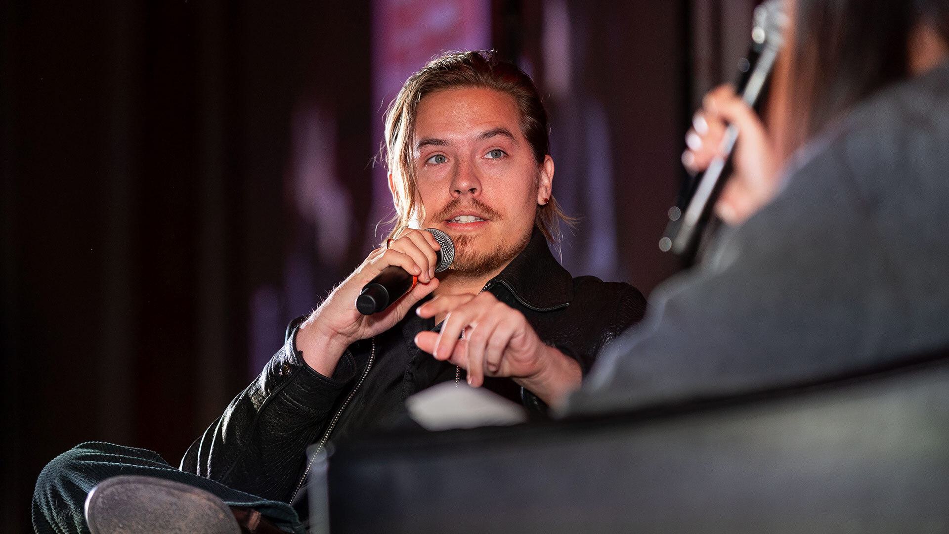 Dylan Sprouse talks on stage