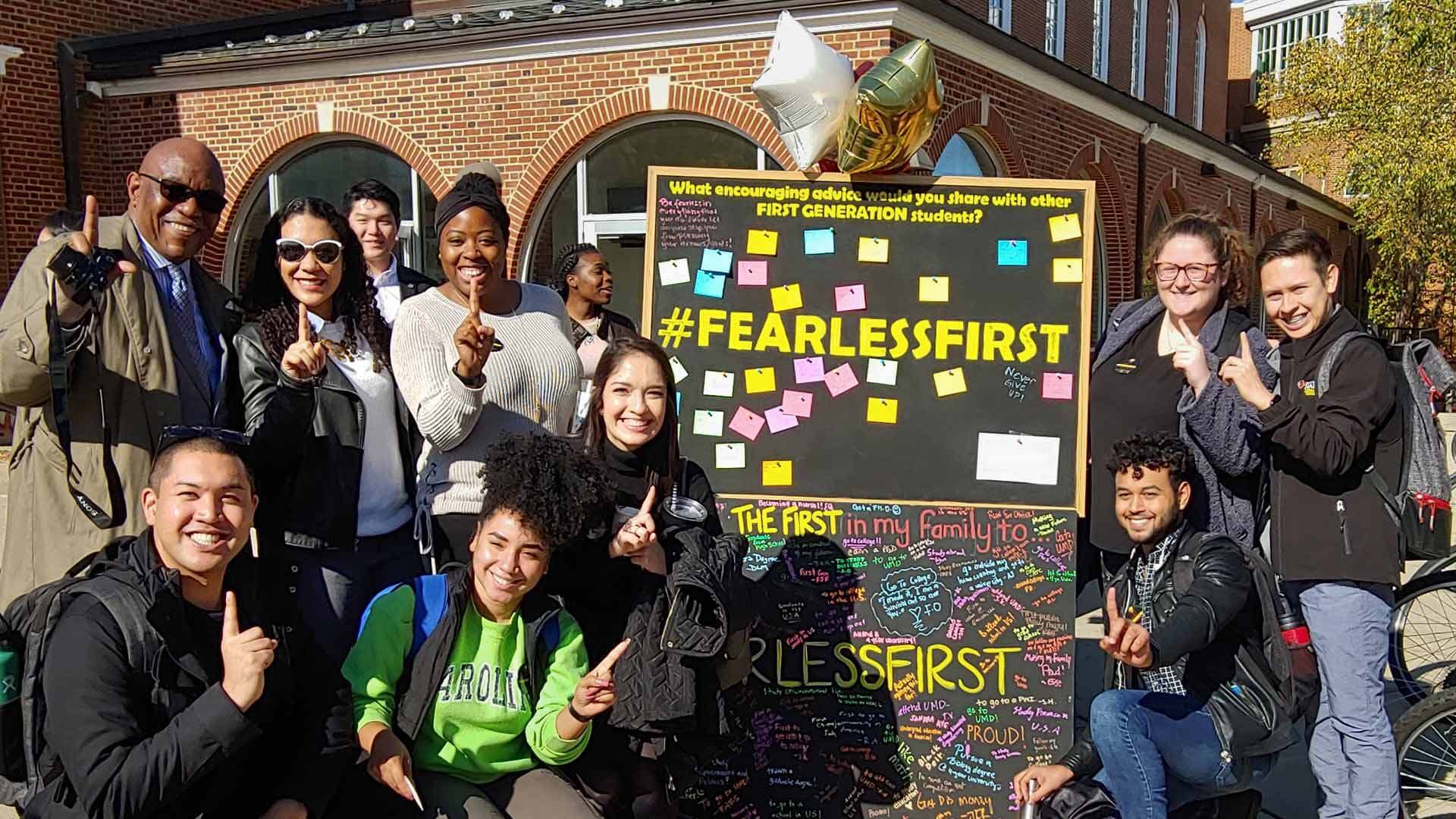 Students pose with #FearlessFirst board
