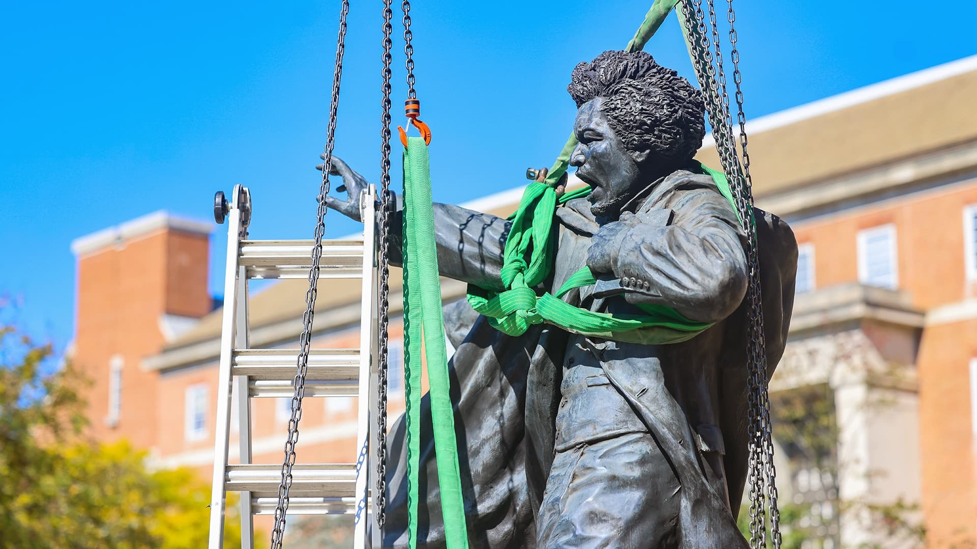 Frederick Douglass statue being removed from its pedestal for conservation