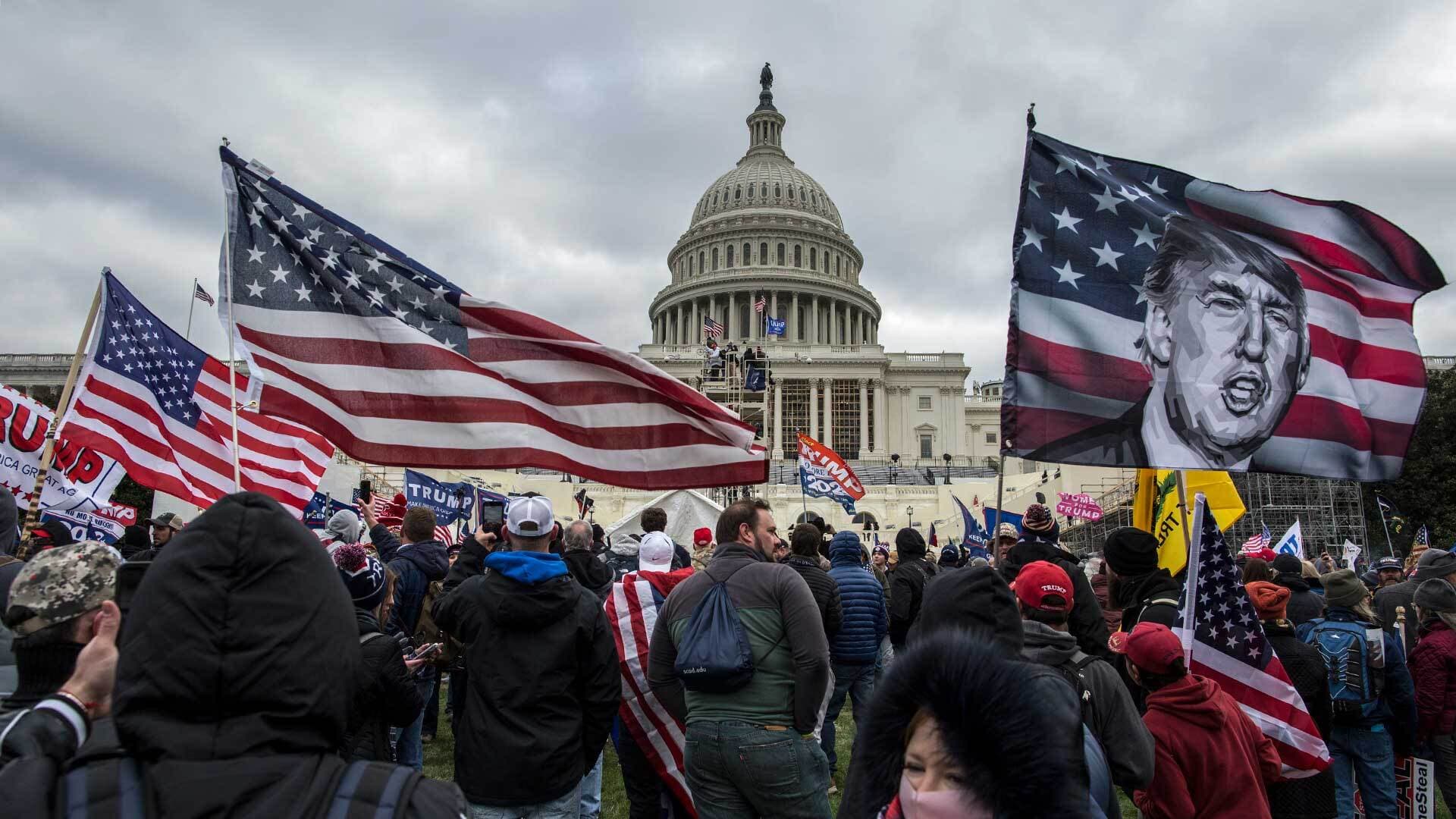 President Donald Trump's supporters converge on the Capitol building on Jan. 6, when rioters stormed the building as lawmakers were set to certify President-elect Joe Biden's electoral victory in what was supposed to be a routine process headed to Inauguration Day.