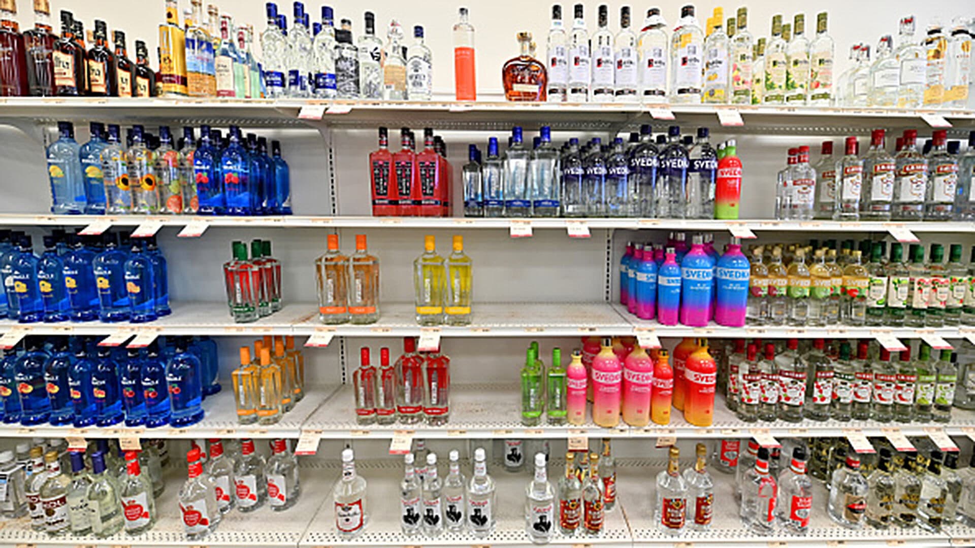 Shelves of vodka with spaces where Russian brands were removed