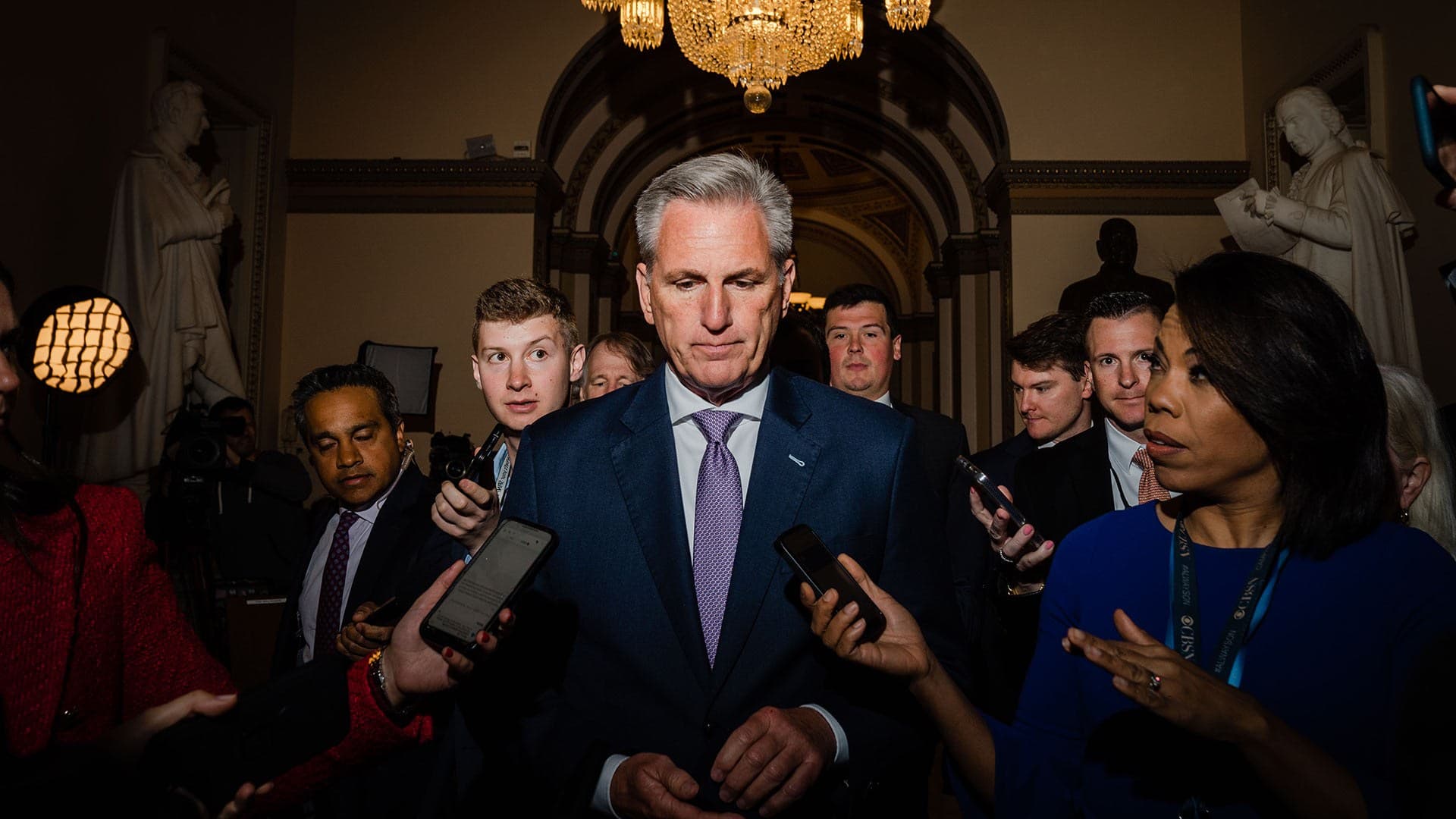 Kevin McCarthy surrounded by reporters