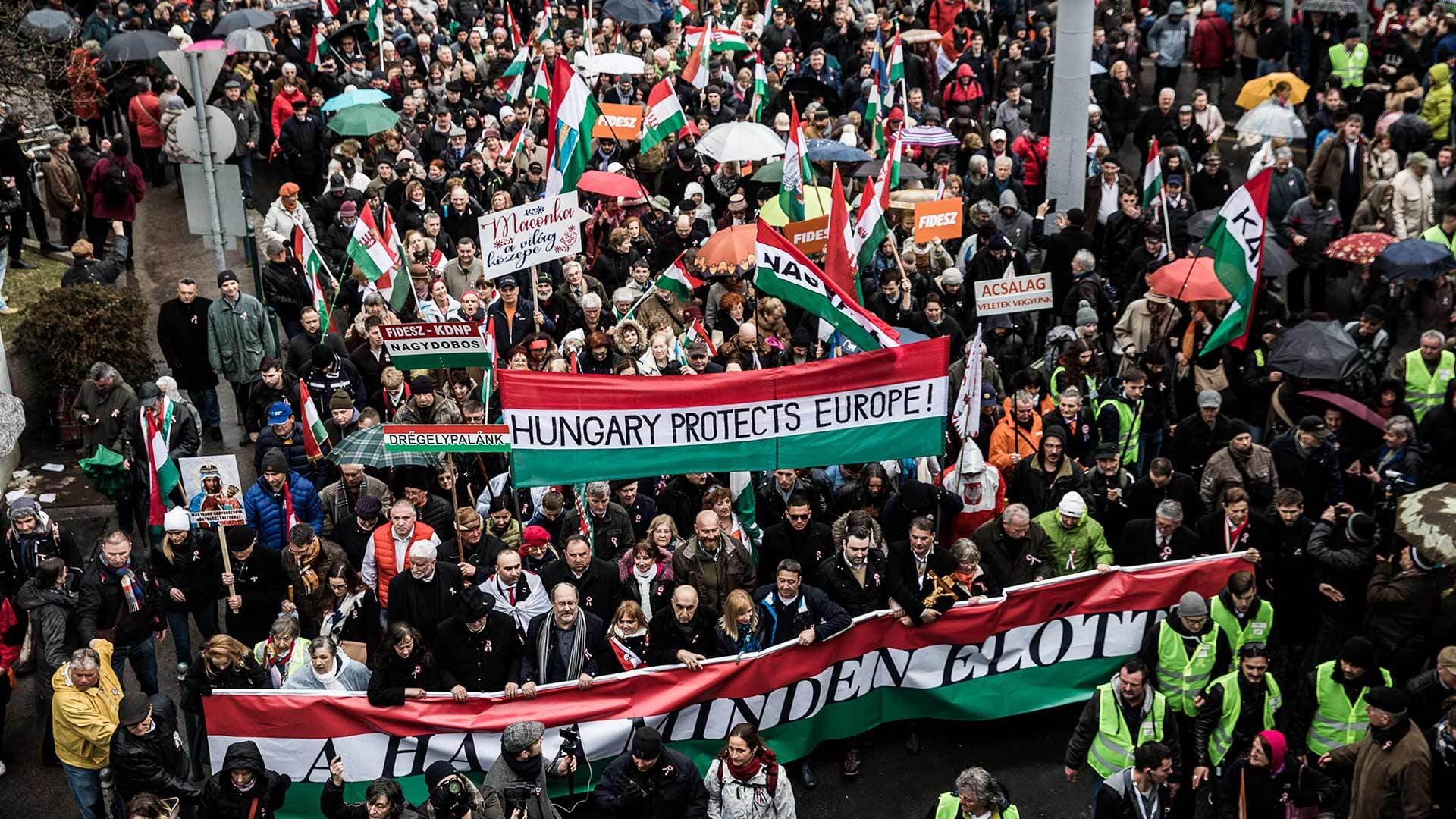 Peace march in Budapest, Hungary. Banner reads "Hungary protects Europe!"