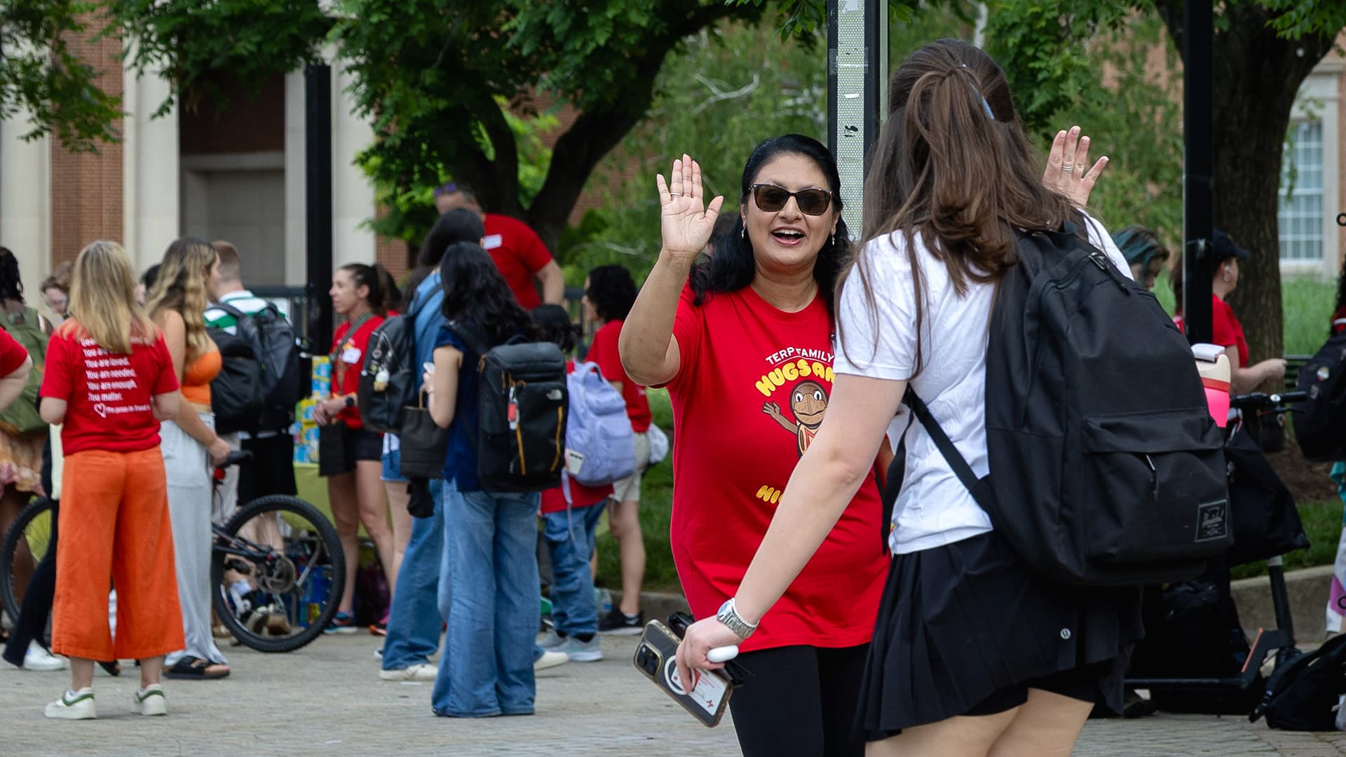 mom high-fives a student