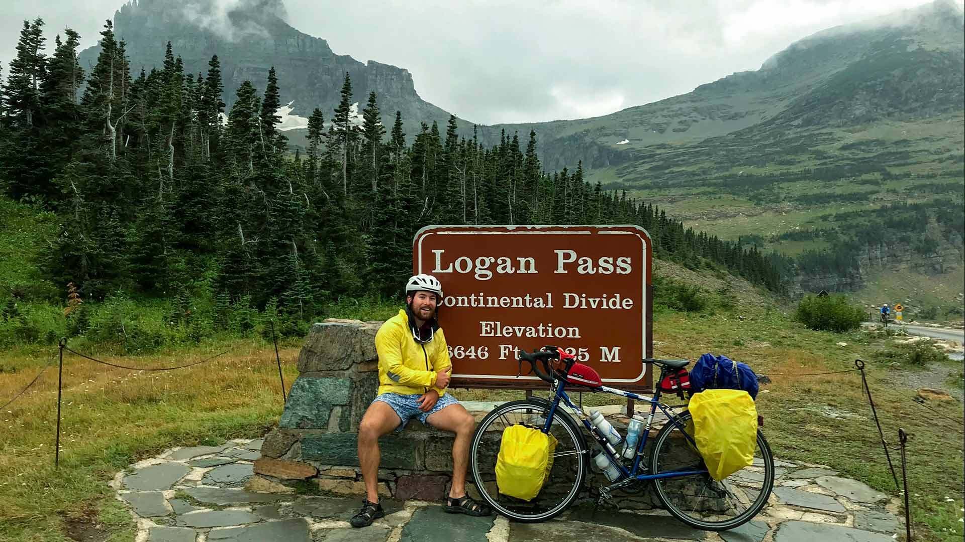 Wil Armstrong at Logan Pass sign