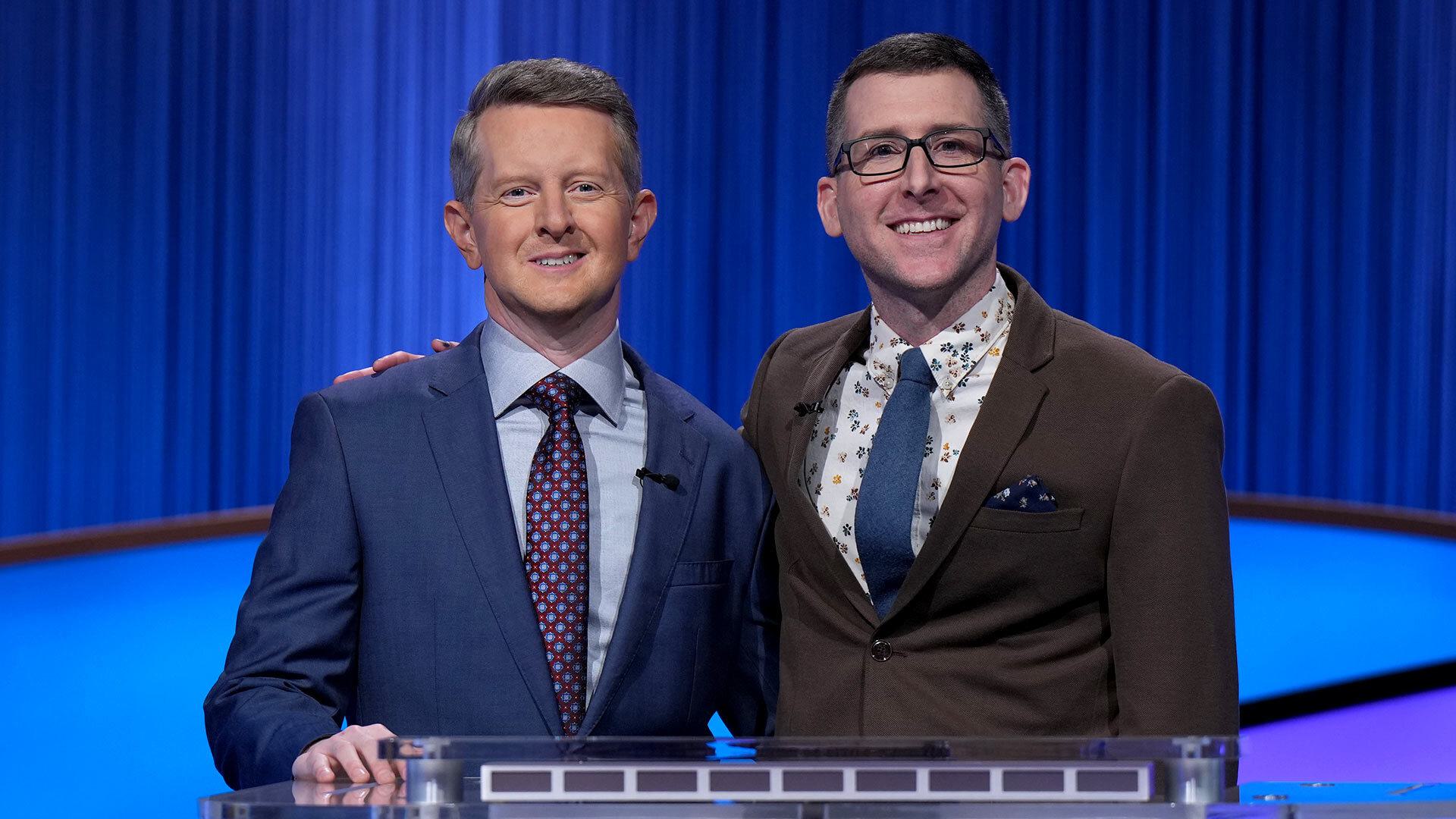 Ken Jennings and Kevin Belle pose on "Jeopardy!" set
