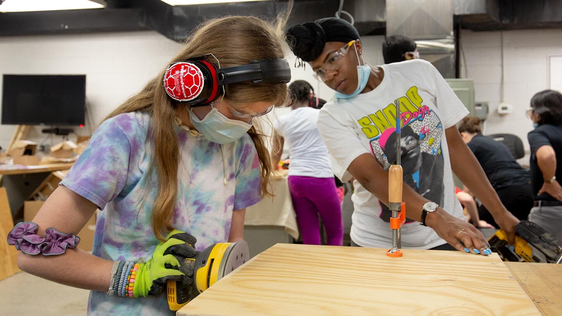 Girls use power tools at M-Power Tools summer camp
