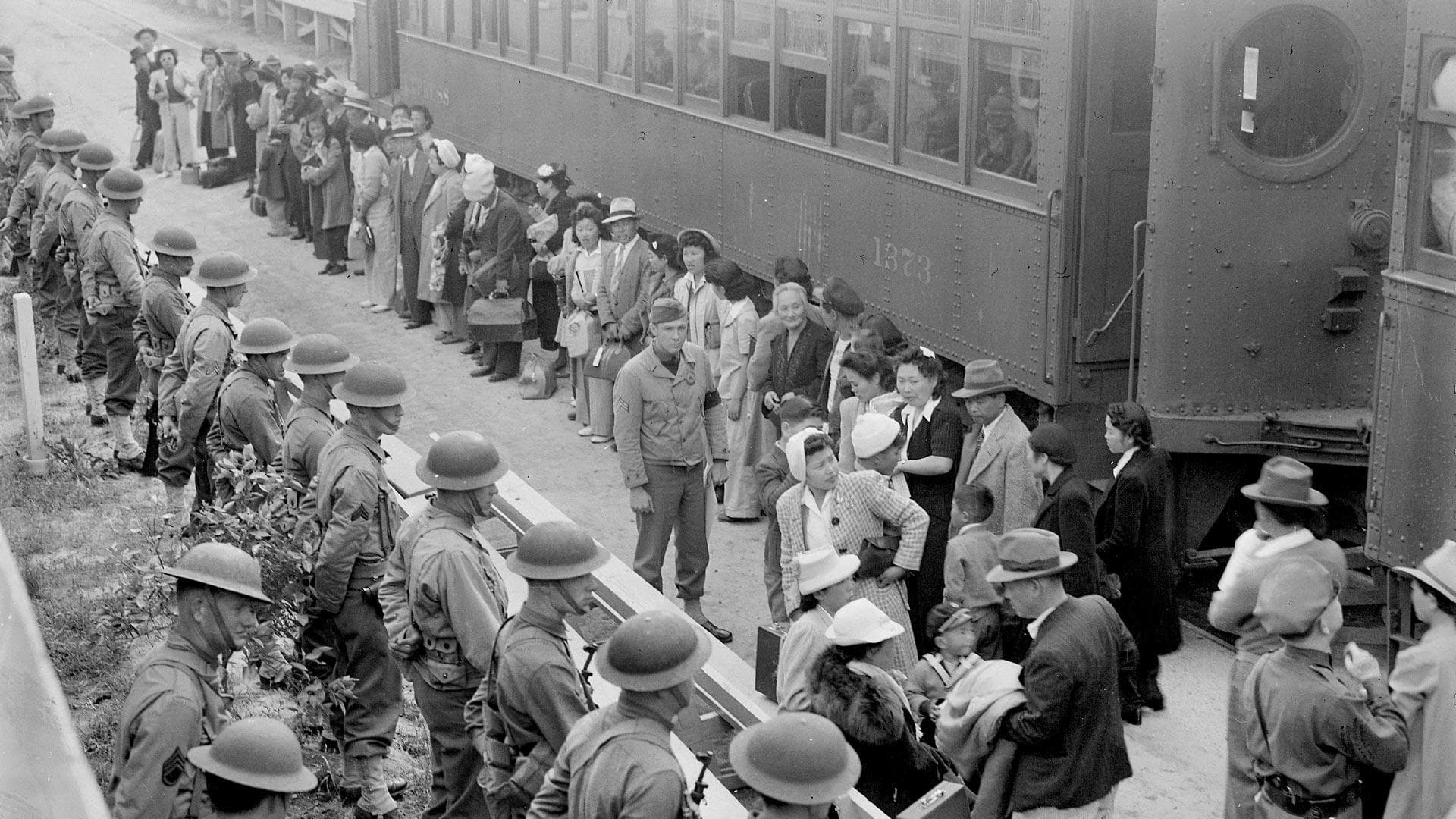 Japanese Americans arrive by train
