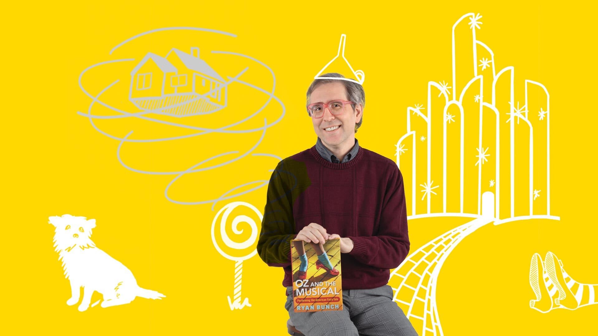 Ryan Bunch poses with "Oz and the Musical" book on yellow background with Wizard of Oz doodles