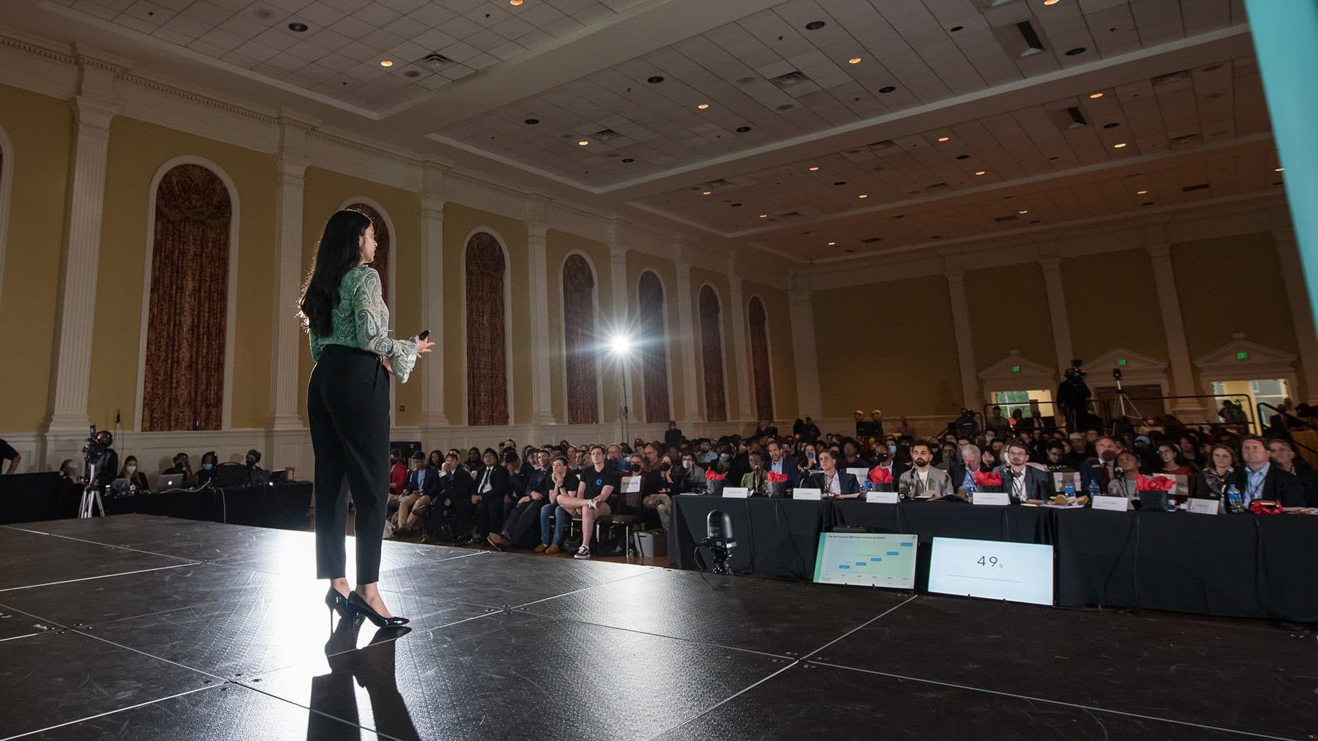 Student onstage at Pitch Dingman Competition