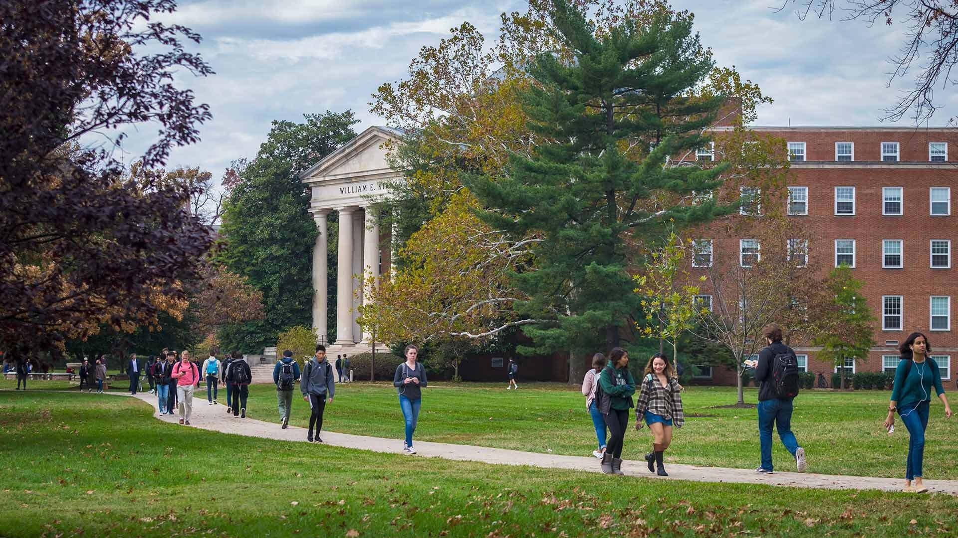 Students walking; According to a new report from the U.S. Department of Education, UMD students graduate with less debt and get higher-paying jobs after graduation, on average, than students from other Maryland, Big Ten and U.S. universities.