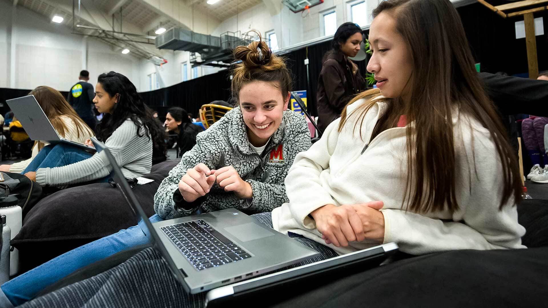 University of Maryland freshmen Sage Leone, left, of Elkton, Md., and Genevieve Sampson, right, of Severna Park, Md., take part in Technica on Saturday at the Armory.