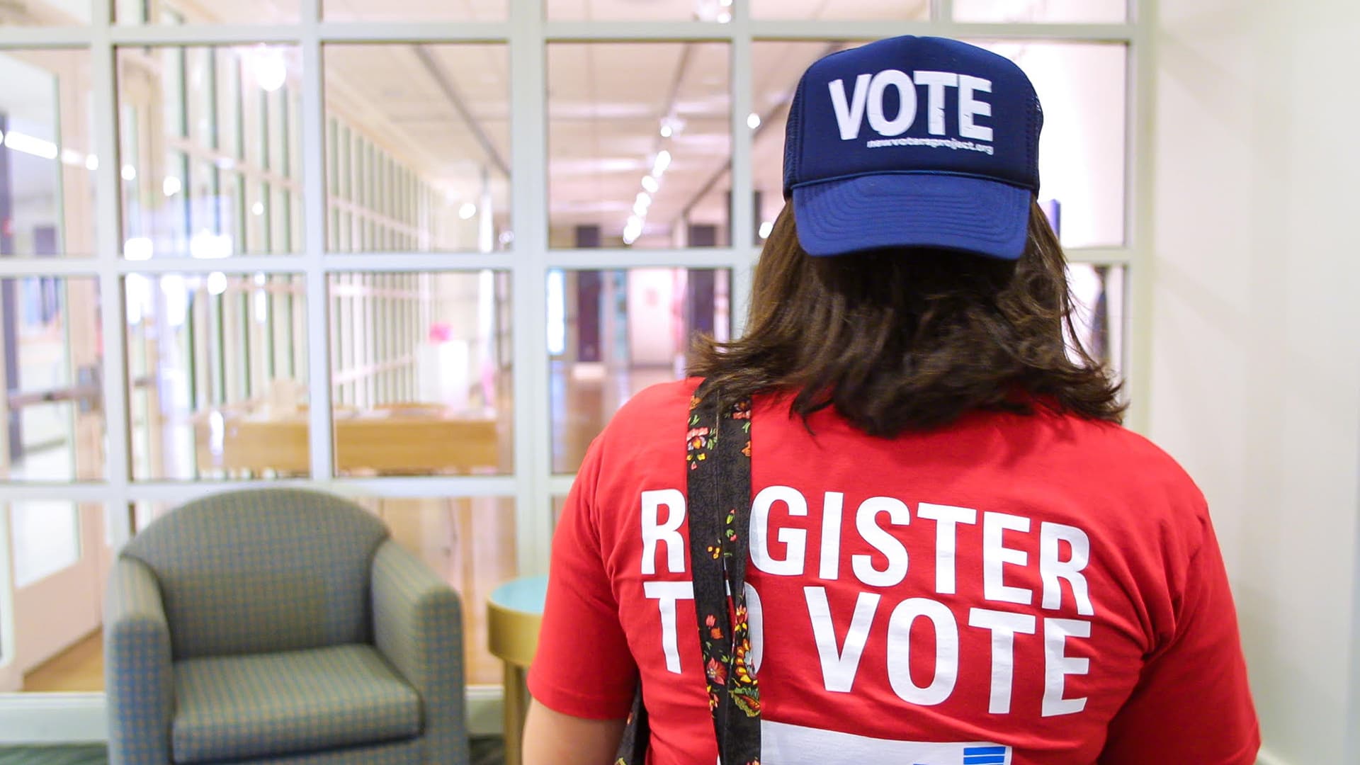Student in "Vote" T-shirt