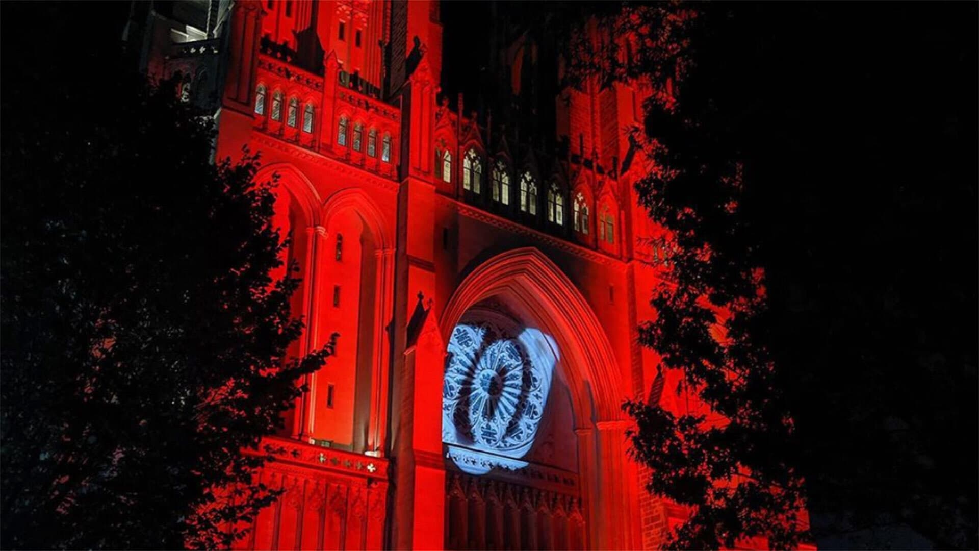 National Cathedral lit up in Nationals colors with curly W