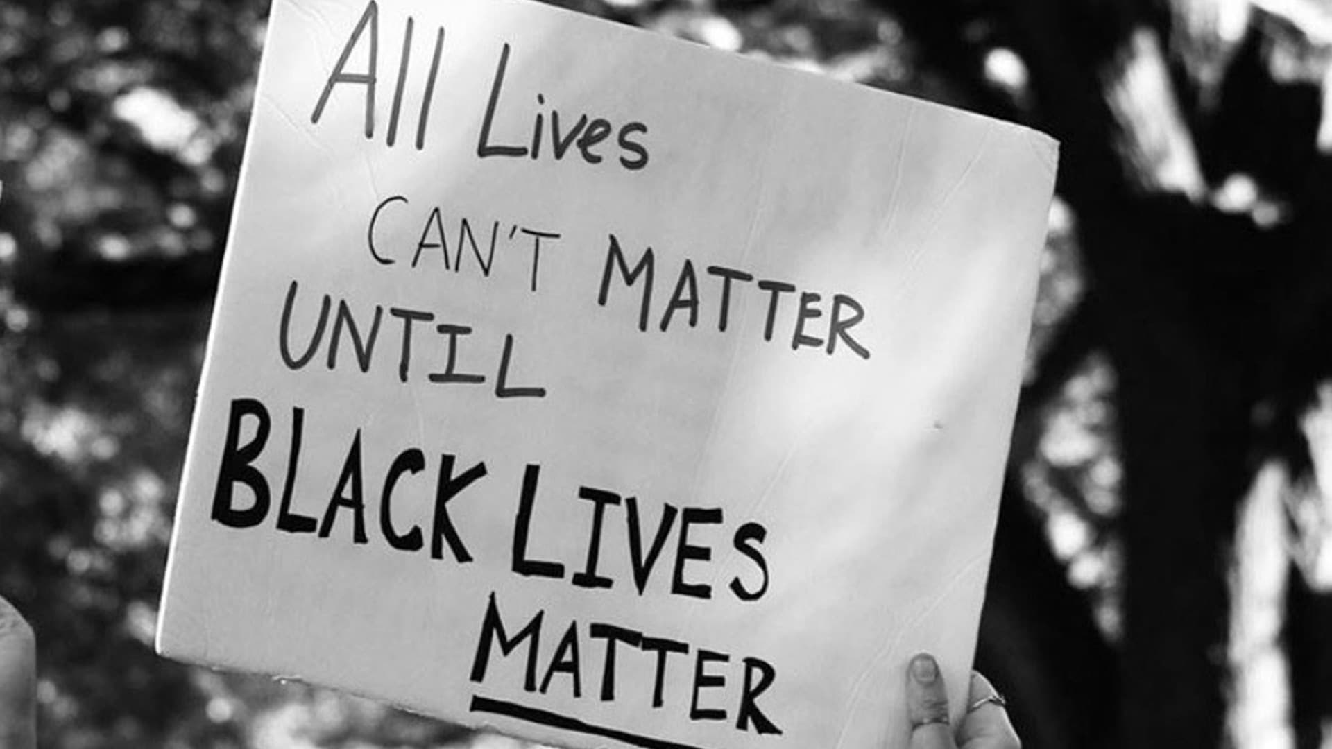Sign that reads, "All lives can't matter until Black Lives Matter"