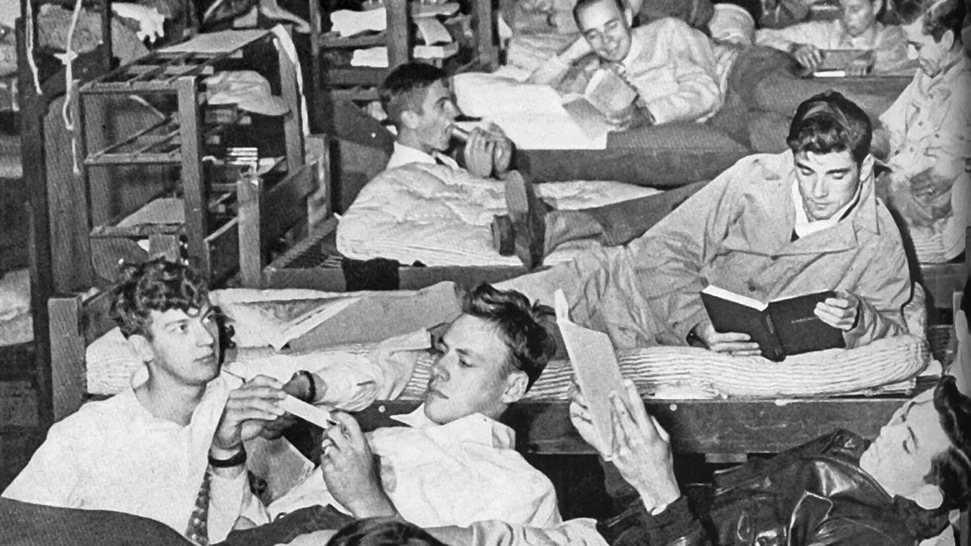 Students in beds in the Armory