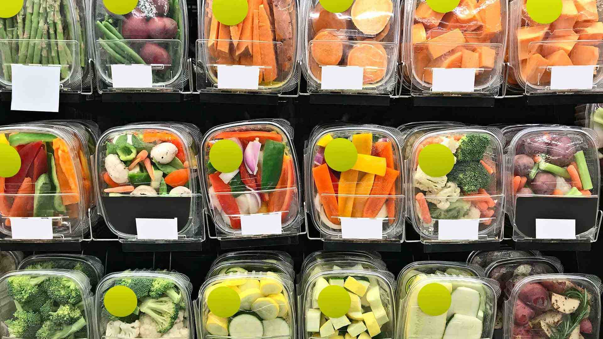 packaged veggies on grocery store shelves
