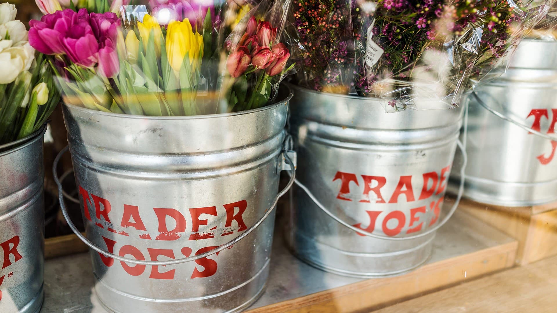 Flowers in Trader Joe's buckets