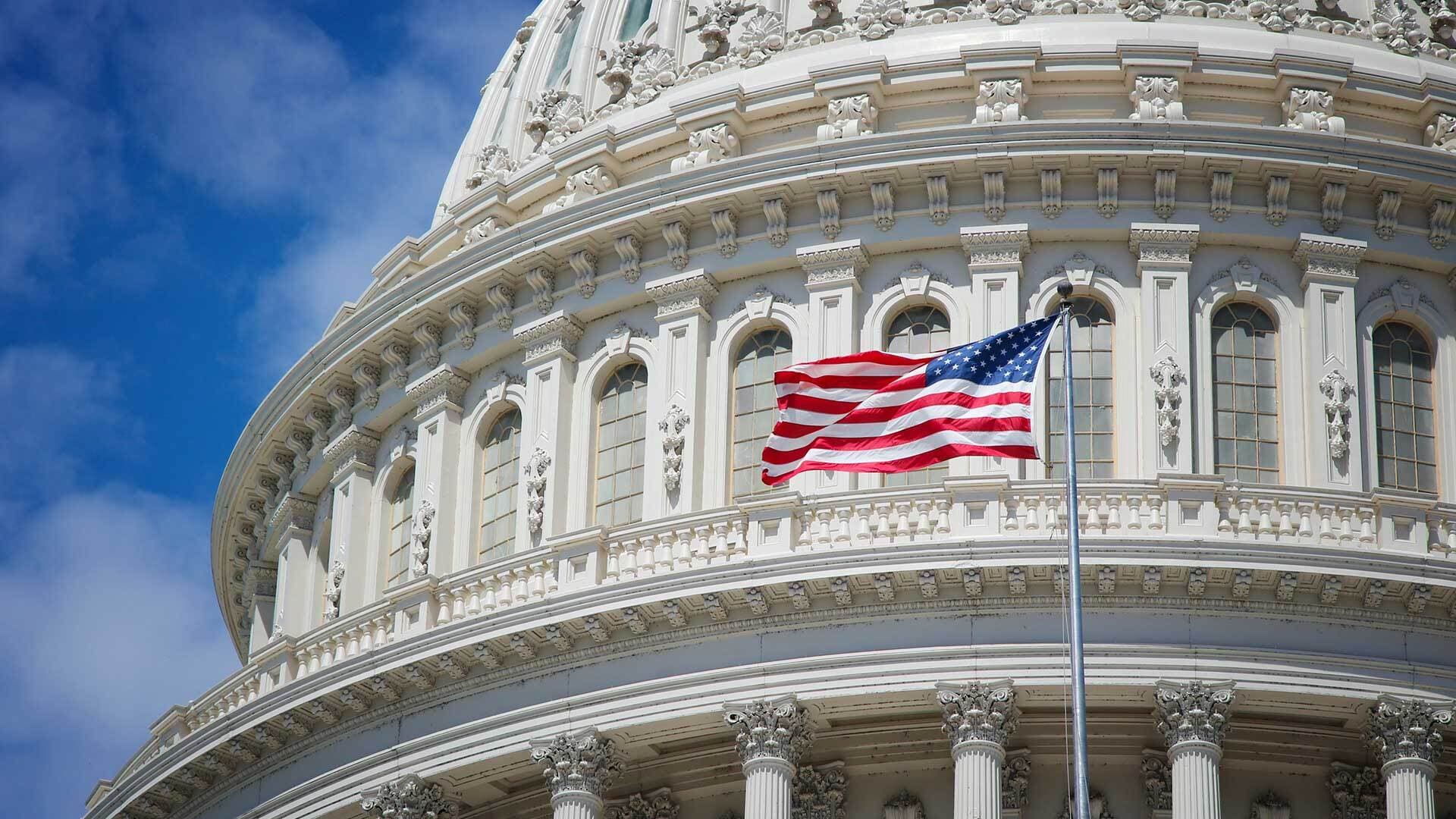 U.S. Capitol building with American flag