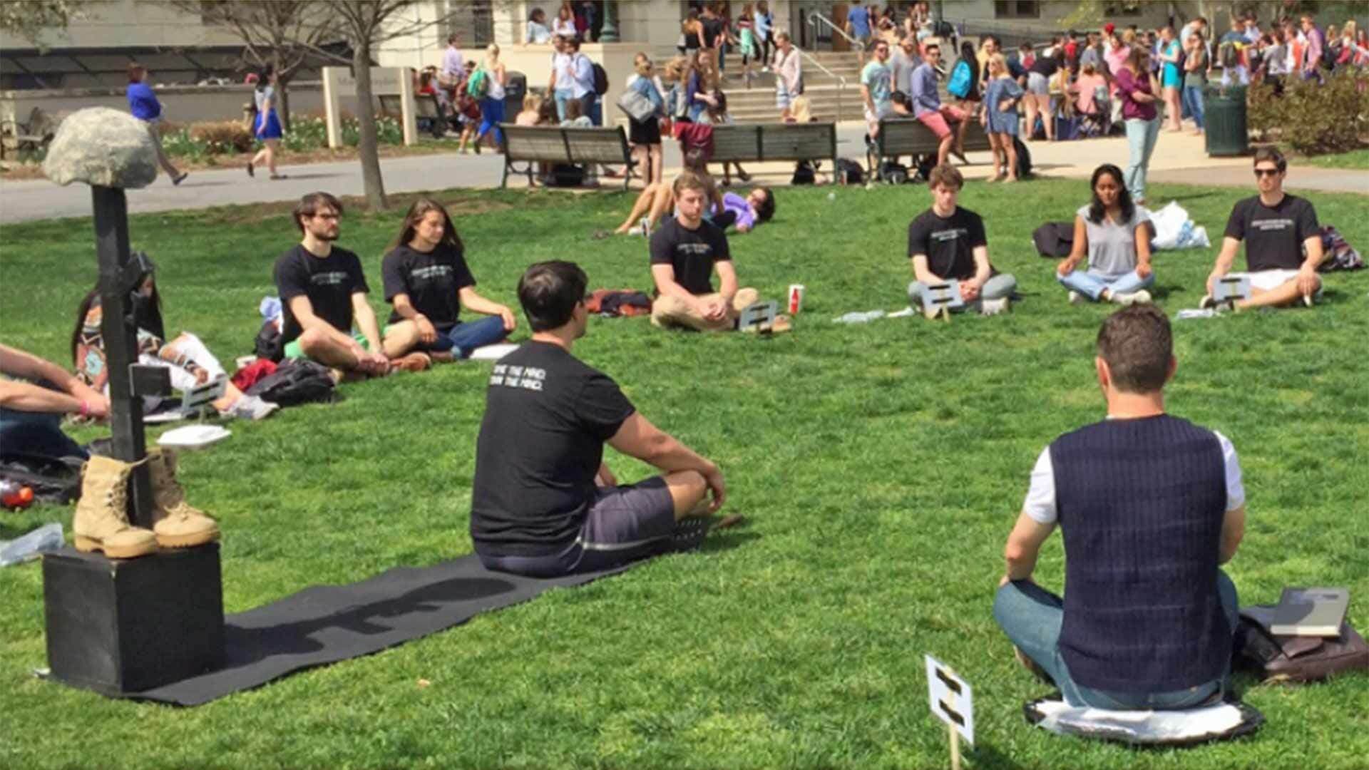 Veterans meditate on lawn