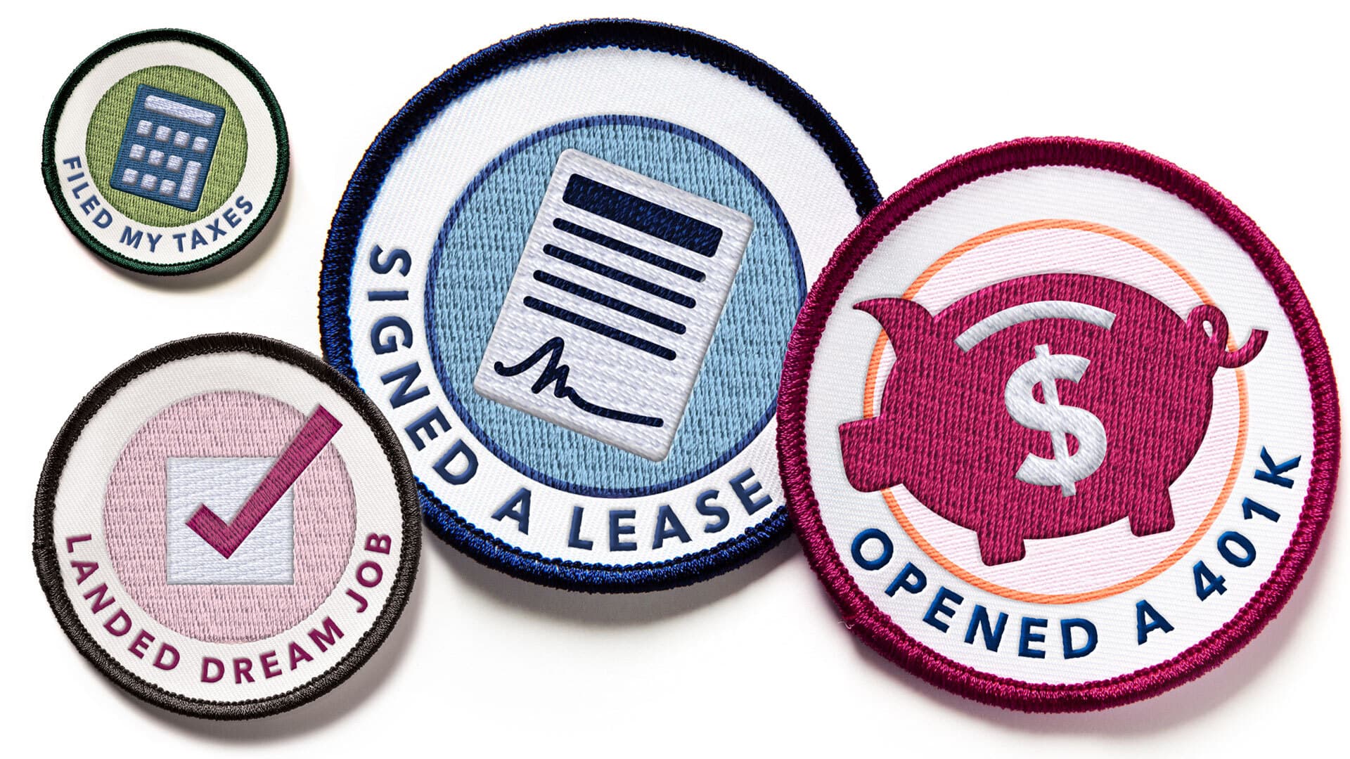 Patches that read, "Filed my taxes," "landed dream job," "signed a lease" and "opened a 401K"