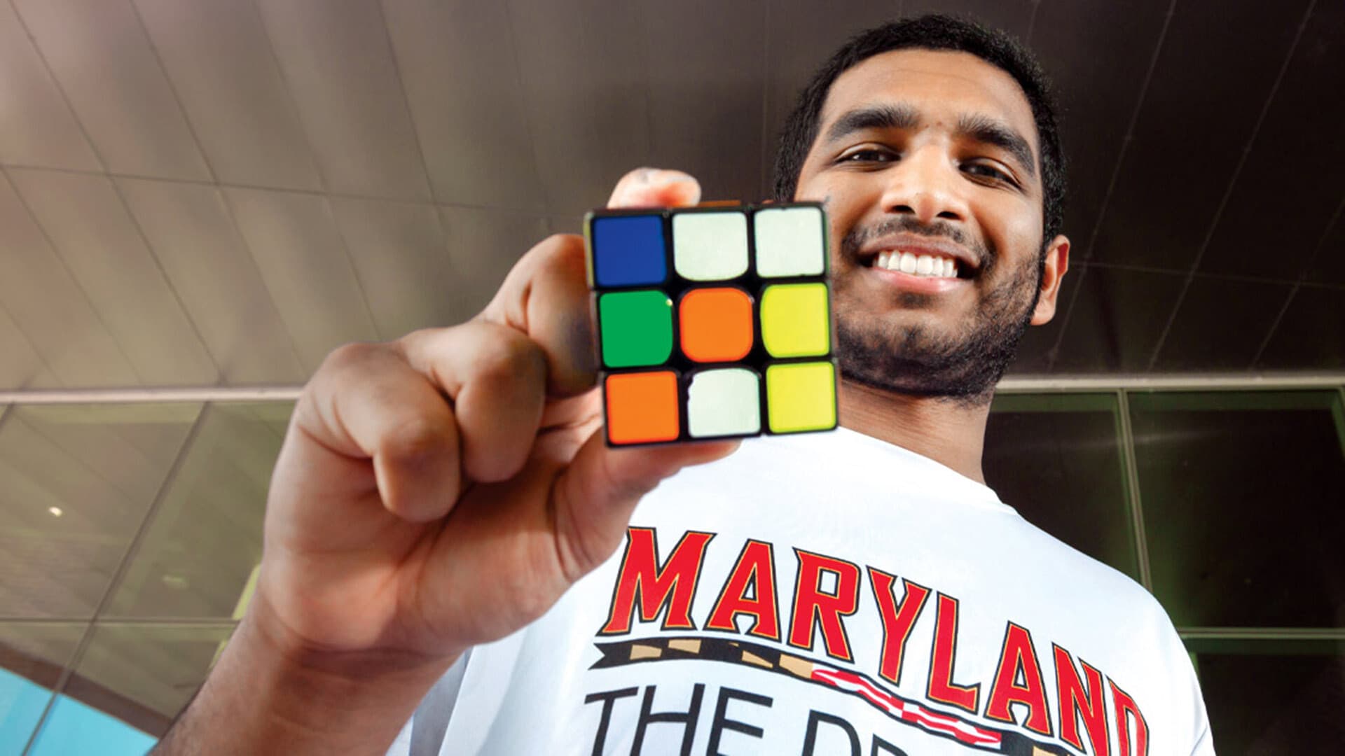 Student holds Rubik's Cube