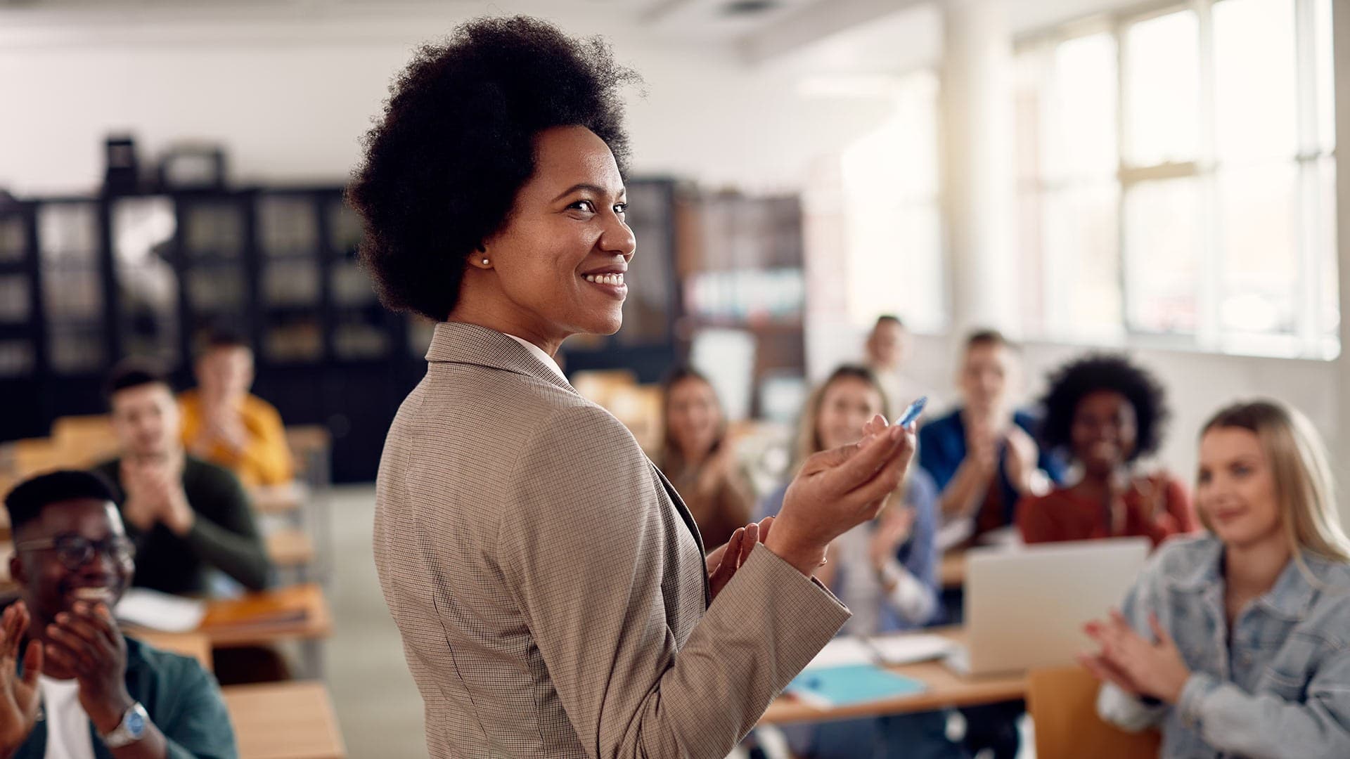 female professor of color teaches class