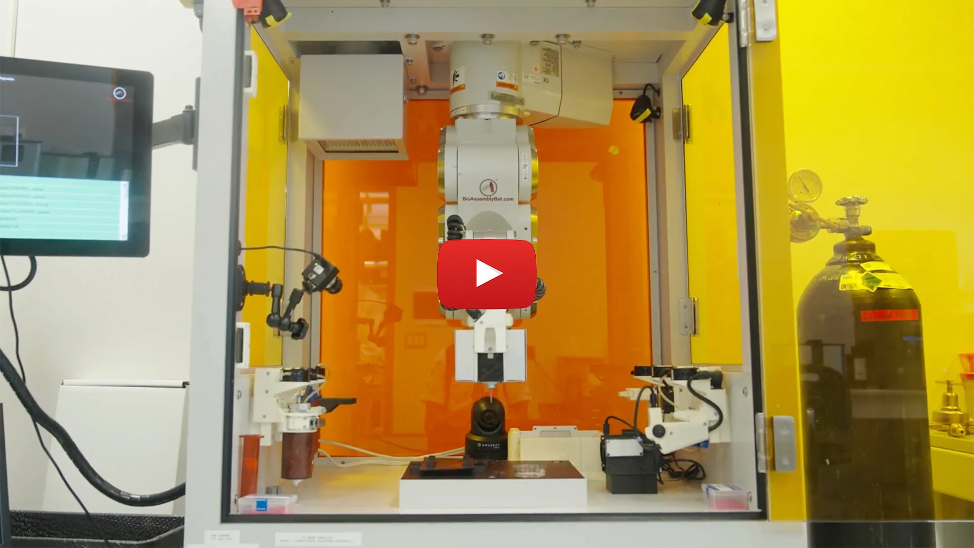 3D printer with red play button