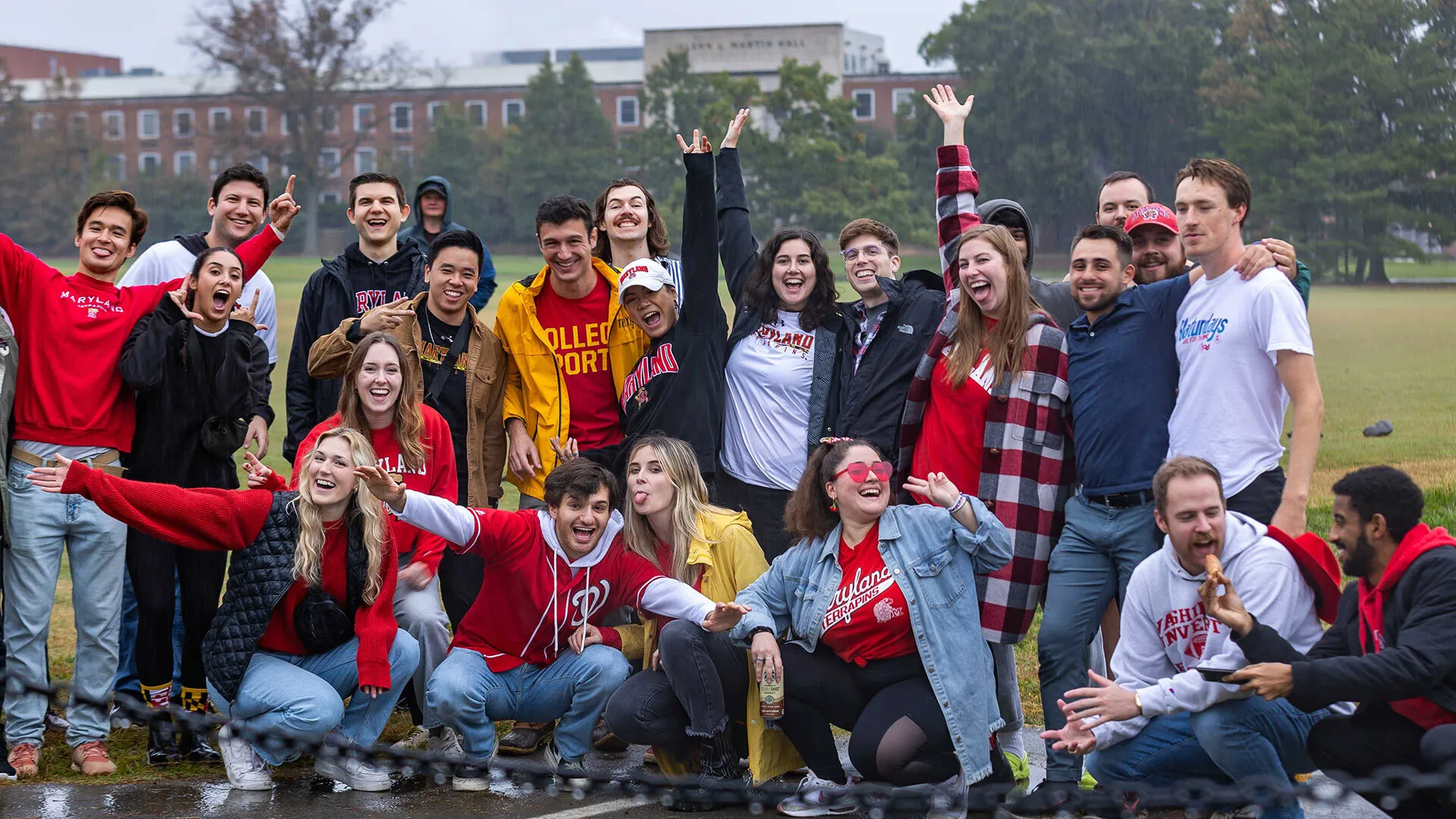 group of alums poses on engineering fields