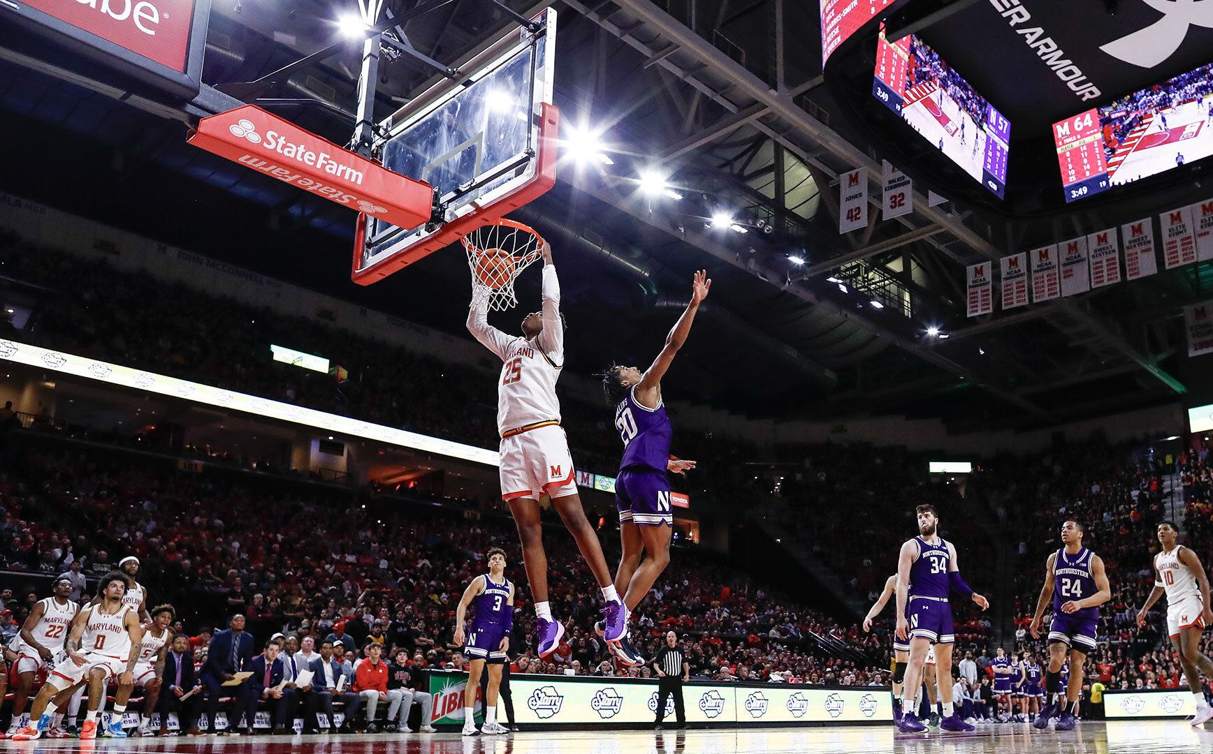 Maryland men's basketball player dunks