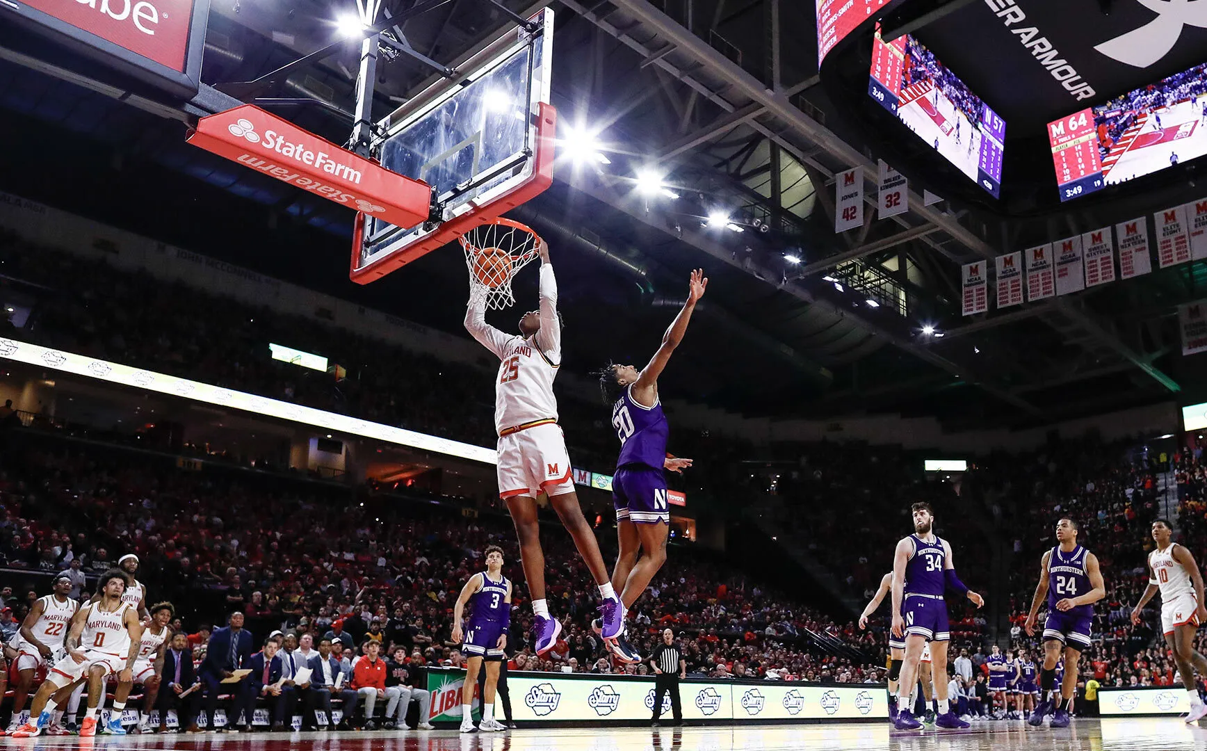 Maryland men's basketball player dunks