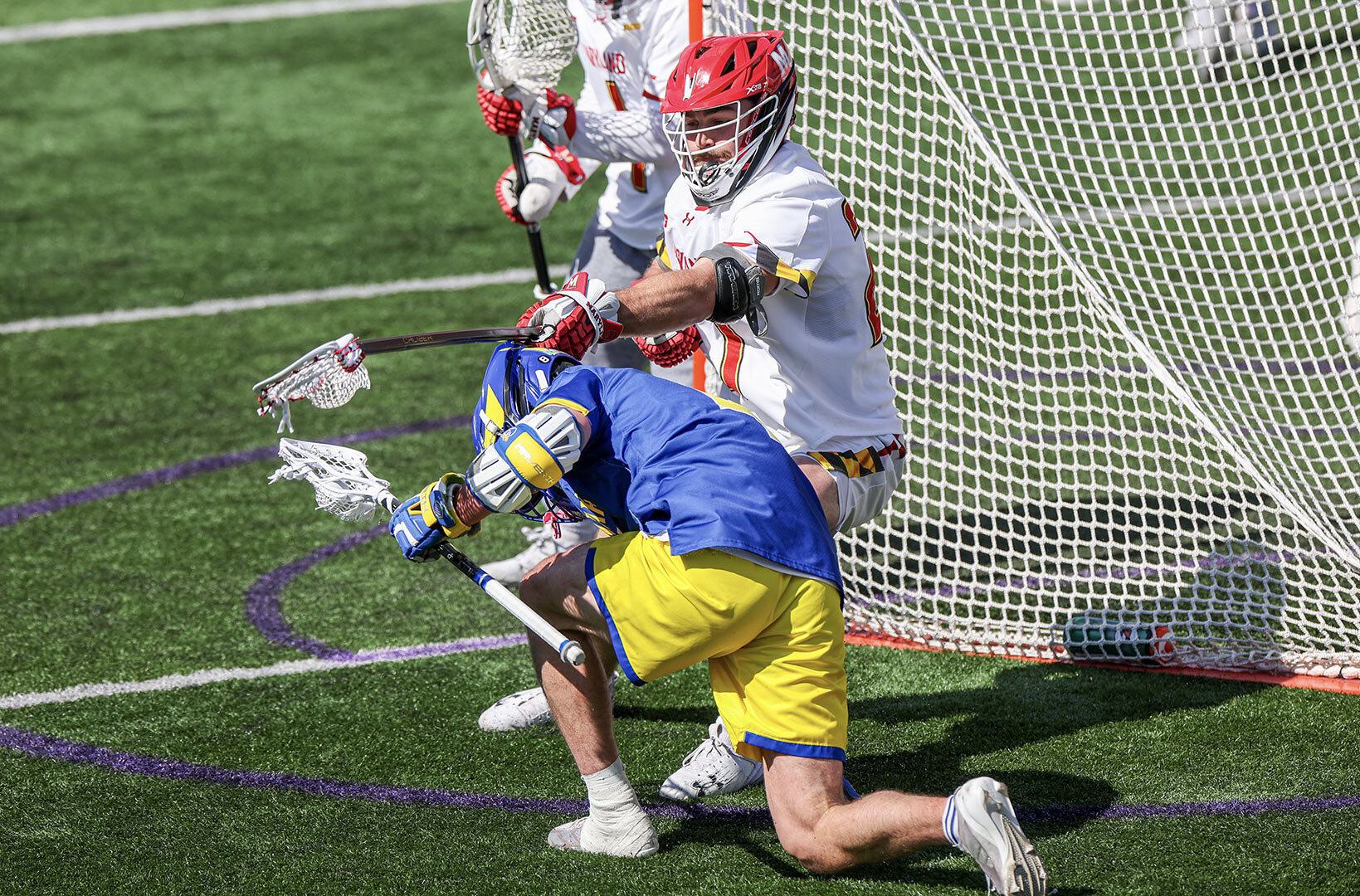 Maryland men's lacrosse player defends goal