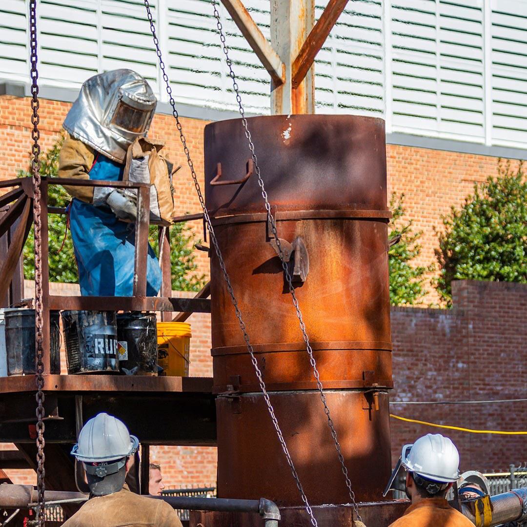 student operates furnace