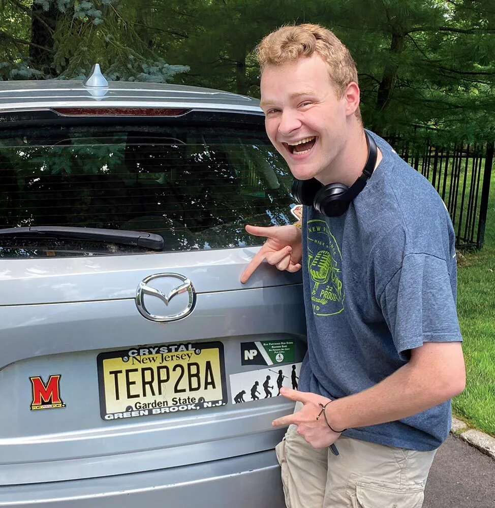 student points to TERP2BA license plate