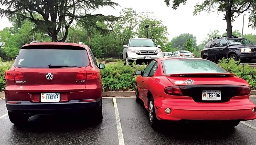 two red cars with TERP07 and TERP06 license plates