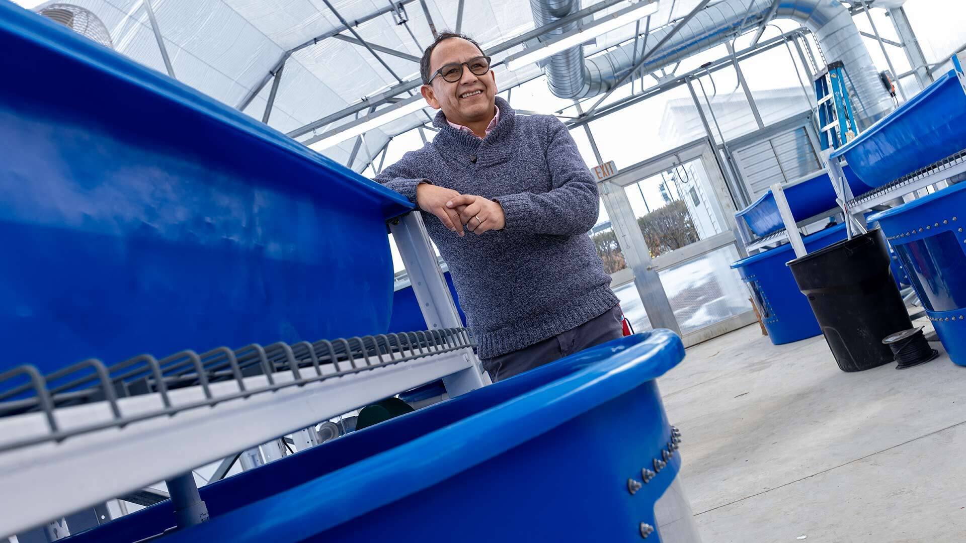 Jose-Luis Izursa poses in greenhouse