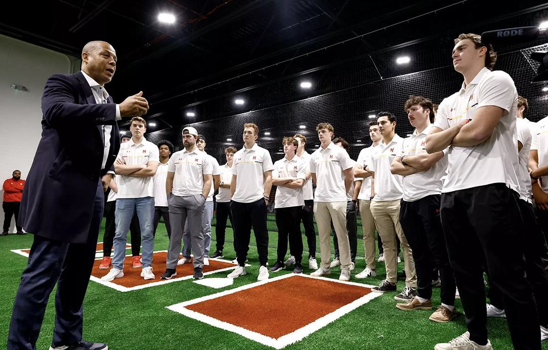 Damon Evans speaks to the baseball team