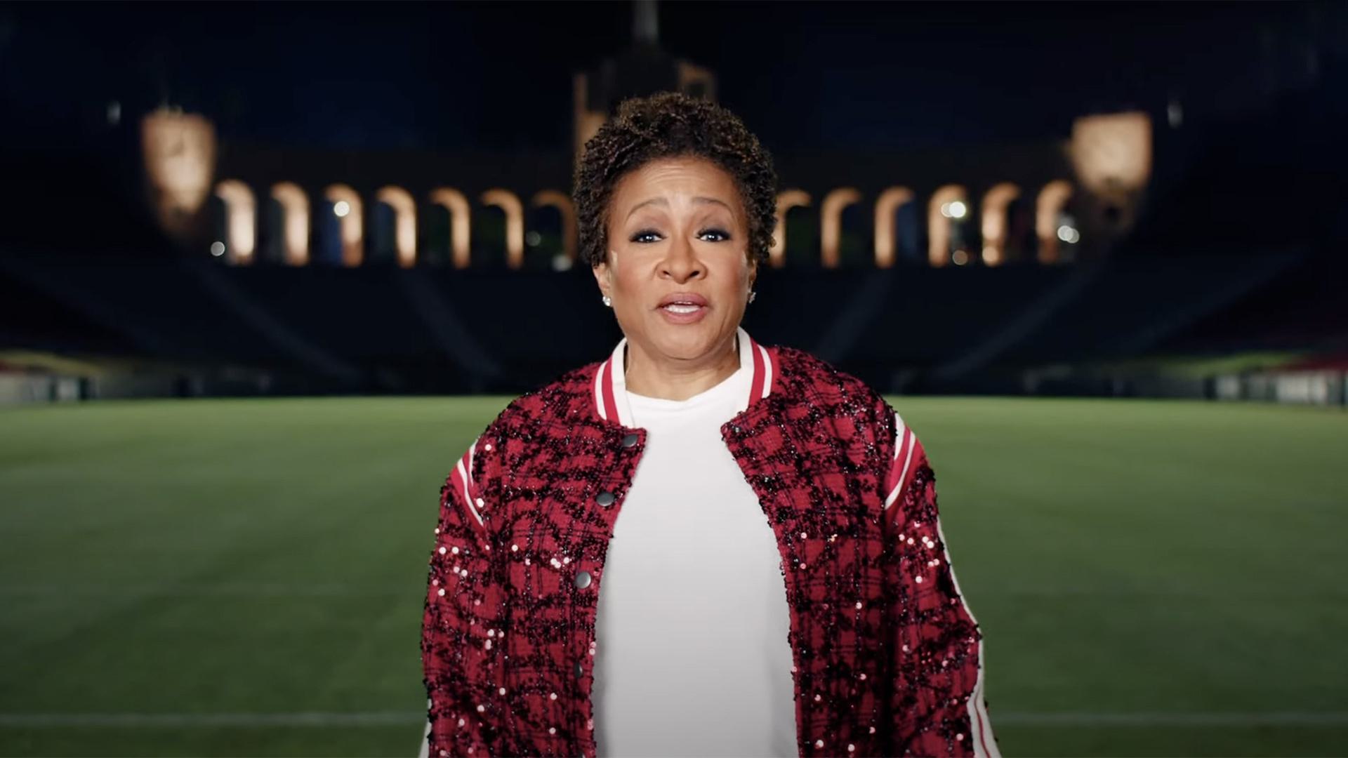 Wanda Sykes stands on field