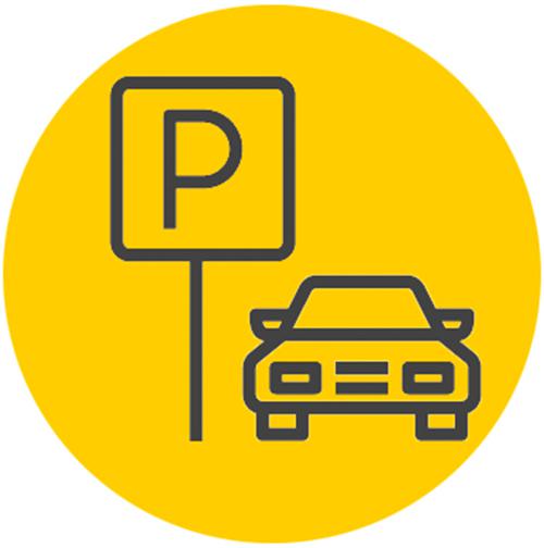 car next to parking sign