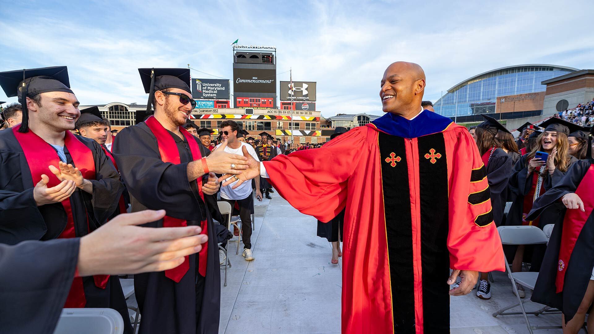 Gov. Wes Moore high-fives graduate