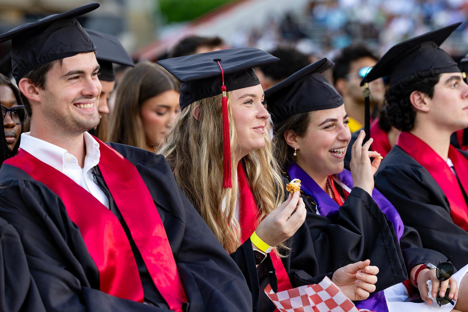 graduate eats chicken tender