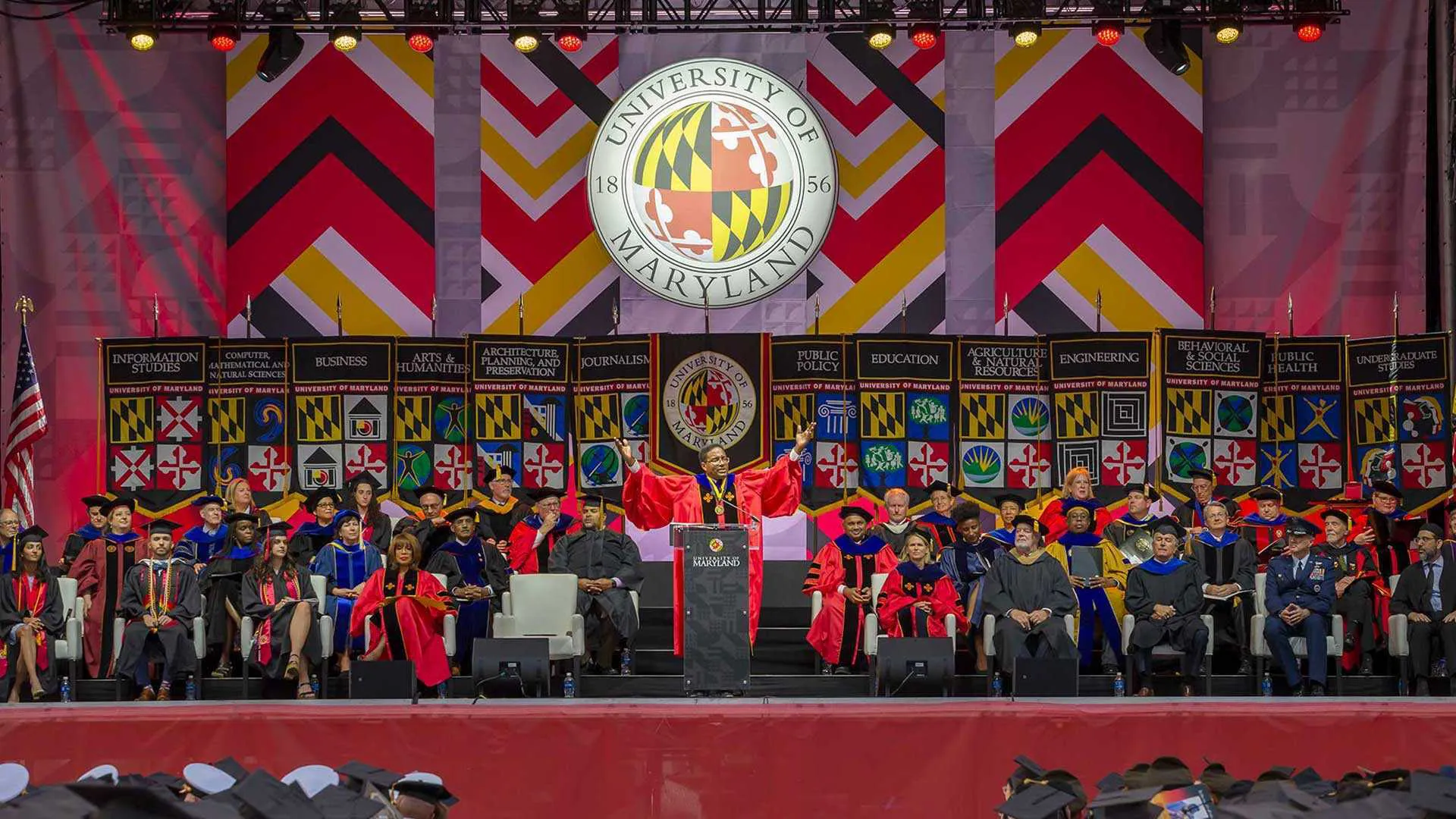 President Pines speaks on stage at Commencement