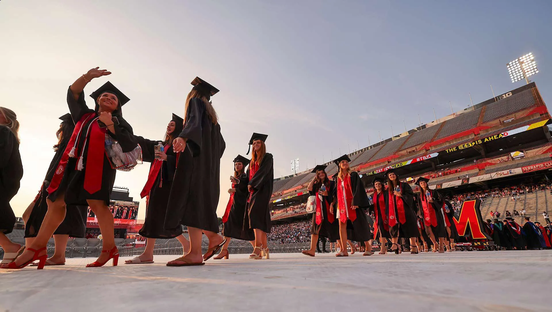 grads process into SECU Stadium